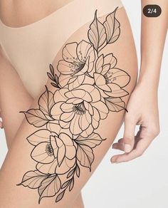 a woman's thigh with flowers drawn on it