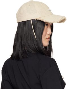 Cotton canvas cap in beige. · Embroidered eyelets at crown · Logo hardware at face · Frayed edge at curved brim · Cord-lock chin strap · Cinch fastening · Canvas browband · Partially lined · Logo-engraved silver-tone hardware Part of the La Casa collection. Supplier color: Light greige Beige Canvas Hats For Spring, Beige Canvas Spring Hats, Spring Beige Canvas Hats, Adjustable Brimmed Canvas Hat, Adjustable Flat Brim Beige Dad Hat, Beige Baseball Cap With Curved Brim, Adjustable Beige Flat Brim Dad Hat, Adjustable Canvas Cap, Beige Baseball Cap With Curved Visor