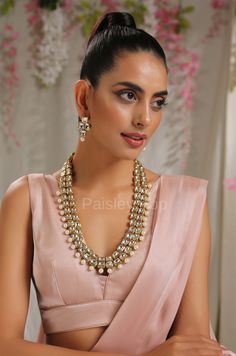 The Kundan and pearls necklace set is inspired by the rich Indian jewelry-making techniques handcrafted by the artisans to celebrate a perfect armor between ancient and modern concepts. The Indian Kundan necklace set is an ode to the beautiful bride as she prepares to begin her new chapter of life. Pair this gorgeous replica of Bollywood jewelry with your ethnic or contemporary ensembles and create a look to remember. Necklace Closure - Adjustable Dori Earrings Closure - Push Back Style Tip - Th Long Kundan Necklace, Necklace Closure, Kundan Necklace Set, Necklace Set Indian, Earrings Indian, Pearl Necklace Set, Kundan Necklace, Bollywood Jewelry, Pearls Necklace