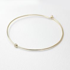 JSVConcepts Fine Jewelry Diamond Bangle Bracelet, Diamond Solitaire Bangle Bracelet, Minimalist Bracelet, 14K Gold Bangle Bracelet, Diamond Bracelet, Gift for her ≫ Product Details ◈ Handmade / Handcrafted Fine Jewelry ◈ Diamond: 100% Natural Diamond ◈ Diamond Weight: 0.07 ct. (2.60 mm) ◈ Color: G Color ◈ Clarity: VS-SI ◈ Cut: Brilliant Cut ◈ Bangle Thickness: 1.30 mm ◈ Metal: Solid 14K Gold (18K also available - Additional fees may apply) ◈ Gold Color: White gold, Rose gold, Yellow gold ≫ Pleas 14k Gold Bangle Bracelet, Layered Bangles, Solid Gold Bangle, Diamond Bangle Bracelet, The Bangles, Trending Bracelets, Bracelet Christmas, Bracelet Diamond, Bracelet Minimalist