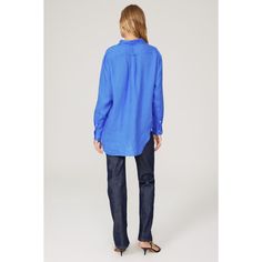 Blue linen (100% Linen). Top. Long sleeves. Collar. Front button closure. 32" from shoulder to hemline. Imported. Blue Linen Shirt For Fall, Spring Blue Linen Blouse, Blue Linen Blouse For Spring, Casual Blue Linen Blouse, Linen Blouse With Button Cuffs For Work, Blue Linen Button-up Tops, Classic Blue Linen Tops, Blue Collared Linen Top, Blue Linen Collared Top