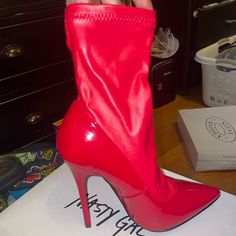 Brand New Never Worn Comes In Box Red Fitted Synthetic Boots, Red Synthetic Boots, Fitted Red Synthetic Boots, Red High Ankle Heels For Party, Red Ankle-high Heels For Night Out, Red Ankle-high Heels, Fitted Red Ankle Boots, Red Ankle Boot Heels For Night Out, Trendy Red Boots For Evening