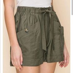 These Super Cute Green Shorts Are Perfect For Any Occasion, They Can Be Dressed Up Or Down. Condition Is New. Size Small Olive Green Elastic Waist Front Tie Shorts Material: 80% Rayon, 20% Nylon Hand Wash, Cold Water, Do Not Bleach, Line Dry. Show In Size Small Chic Olive Bottoms For Summer, Casual Olive Bottoms For Day Out, Olive Spring Shorts, Olive High Waist Bottoms For Summer, High Waist Olive Bottoms For Summer, High-waisted Olive Bottoms For Summer, Olive High-waist Bottoms For Summer, Olive Summer Shorts, Casual Olive Bottoms For Summer