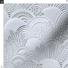 white paper with intricate designs on it