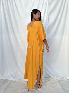 Celebrate your curves with our plus size kaftan dress. Created to embrace all body types, this kaftan is designed with care and style in mind. Its loose, flowing silhouette complements your figure while offering unbeatable comfort. The perfect choice for a night on the town or lounging at home. Plus Size Kaftan, Hang Loose, Kaftan Dress, Light Orange, Tie Dyed, Body Shapes, Body Types, Floor Length, Hand Dyeing