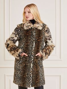 Faux fur coat. Classic collar. Long sleeves. Front button fastening. Regular fit. FABRIC DETAILS: Animalier print. Front pockets. Picture shows size 40. Total lenght: 92 cm / 36.22 inch. Sleeve lenght: 62,5 cm / 24.61 inch. SHELL (main fabric): 38% Acrylic, 37% Modacrylic, 25% Polyester; LINING: 100% Polyester; SLEEVES AND COLLAR: 53% Modacrylic, 27% Acrylic, 20% Polyester. WASH LABEL: Dry clean. This item for safety for the store cut in half or marked with black marker the labels to avoid retur Trendy Long Faux Fur Coat, Chic Leopard Print Winter Outerwear, Winter Leopard Print Outerwear With Faux Fur Trim, Fall Leopard Print Fur Coat With Faux Fur Lining, Trendy Long Coat With Faux Fur Lining, Trendy Long Fur Coat With Faux Fur Lining, Fitted Luxury Fur Coat With Faux Fur Lining, Luxury Leopard Print Outerwear For Fall, Trendy Fitted Fur Coat With Faux Fur Trim