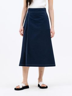 This is a clean and comfortable skirt by Jun by Jun k. that is made out of high quality and sturdy material. With distinctive mood of the design and comfortable wear, you can style it for your minimal daily outfit.- Contrasting color stitches detail- Bio washed cotton fabric- Minimal and clean comfortable mood Navy Cotton Lined Skirt Bottoms, Versatile Cotton Skirt With Relaxed Fit, Cotton Midi-length Workwear Bottoms, Cotton Midi Bottoms For Work, Cotton Midi-length Bottoms For Work, Versatile Cotton Skirt, Navy Cotton Lined Skirt, Versatile Cotton Skirt For Work, Versatile Relaxed Fit Cotton Skirt