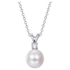 This classic understated pearl pendant, is perfect for a bride. A beautiful 8mm pearl is perfectly suspended below a delicate claw set round brilliant cut. Composed of 925 sterling silver with a high gloss white rhodium finish. Compliment with our matching Lydia Pearl Stud Earrings. Whether you're looking for a classic piece to add to your jewellery box, or something totally on-trend, designers Lustre of London believe that every woman should have the chance of owning exquisite designer jewelry, for that extra sparkle and glamour. Lustre of London’s versatile day and night collections represent traditional and contemporary designs of earrings, rings necklaces etc that will make heads turn. Breath-takingly flawless and inspiring jewelry with a blend of semi-precious gemstones and diamond si Bridal Pendant, Pendant With Chain, Diamond Simulant, Pearl Stud Earrings, Pearl Studs, Designer Jewelry, Pearl Pendant, Semi Precious Gemstones, Ring Necklace