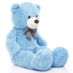 a blue teddy bear sitting on the ground