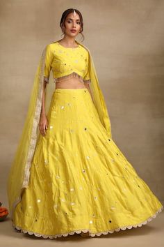 Buy Yellow Silk Chanderi Embroidery Zari Round Neck Mirror Bud Bloom Lehenga Set For Women by Trendy tokari Online at Aza Fashions. Unstitched Raw Silk Lehenga With Gota Work, Navratri Slub Silk Sets With Dori Work, Designer Raw Silk Lehenga With Gota Work, Yellow Raw Silk Choli With Dupatta, Semi-stitched Slub Silk Lehenga With Gota Work, Yellow Silk Lehenga For Eid, Yellow Traditional Wear With Mirror Work And Kundan, Yellow Silk Choli For Eid, Yellow Raw Silk Anarkali Set With Mirror Work