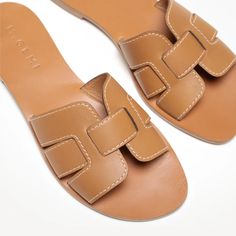 The Mafalda - Tan - Vachetta - M.Gemi Casual Summer Slides For Travel, Adjustable Chic Mules For Vacation, Brown Slide Mules For Vacation, Leather Slides For Vacation, Brown Summer Mules For Vacation, Brown Slides For Vacation, Summer Style Brown Mules For Vacation, Summer Leather Slides For Vacation, Brown Summer Slides For Vacation