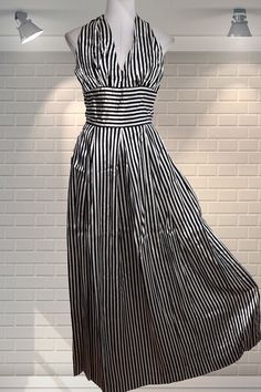 "Stunning striped acetate hostess party dress by Trina Lewis Couture - this one is from the late 1970s/early 1980s. Halter neck, fitted bodice, long full sweep skirt.   In good cared for condition - fabulous piece.  The zip has been restitched at the top (see photo) Size 10 on the label - It measures like an approximate UK 6 Chest:  32\" Waist:  24\" Hips:  Free Shoulder to hem:  60\" Please ask if you have any questions  :) Please note:  this is a used item, not new and not pristine.  My items have been in storage and may require laundering.  If there is a problem with your order please contact me straight away - I always work with my customers to try and resolve any issues. Please read the item description and measurements carefully before bidding to try and limit the wastage created by Striped V-neck Party Dress, Striped Maxi Dress For Summer Evenings, Sleeveless Striped Midi Dress For Party, Striped Sleeveless Midi Dress For Party, Elegant Striped Maxi Dress For Spring, Striped Sleeveless Formal Dress, Striped Midi Dress For Party, Striped Midi Dress For Evening, Sleeveless Striped Party Dress