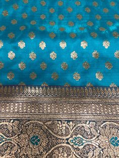 Stunning Woven Bondi Blue color Banarasi Saree with Red border, running Blouse piece Blue Banarasi Silk Blouse For Eid, Blue Banarasi Silk Blouse Piece For Eid, Blue Handloom Katan Silk Blouse Piece, Blue Katan Silk Handloom Blouse Piece, Blue Banarasi Silk Blouse With Self Design, Blue Banarasi Silk Blouse Piece For Puja, Blue Chanderi Blouse Piece With Traditional Patterns, Blue Semi-stitched Blouse With Traditional Patterns, Blue Jamawar Blouse Piece For Navratri