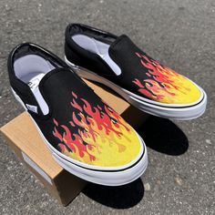 These custom BLVD Slip On Shoes have been customized with Flames.  These shoes have canvas uppers.  Vulcanized waffle rubber outsoles. For Men and Women. Designed by Blake Barash.  We buy each pair of shoes BRAND NEW. Each pair is made to order, please make sure you put in the correct shoe size before you check out. The ink is permanent and will never come off, fade away, or peel off. Made in the USA. This price includes everything: shoes, artwork, and shipping. Thanks for stopping by our Etsy shop! Please message me with any questions! Looking for a size you don't see available? Checkout our Vans listing: https://bit.ly/44eXJp6 Please know your size before ordering. Sizes listed are in US sizing scale. Please note that colors of actual item may slightly differ from what you see on your sc Flame Shoes, Custom Slip On Vans, Shoes Artwork, Fire Painting, New Converse, Star Shoes, Custom Sneakers, Painted Shoes, Shoes Brand