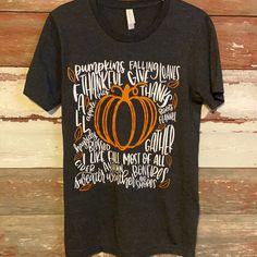 Everything Thing Fall!! Pumpkins, Falling Leaves, Boots, Flannel, Gather, Apple Pie Are Just A Few Of The Many Fall Sayings On The Front! Gray Color With Orange And White Lettering! Perfect For Fall!! Size Small 26 Inches Long. Chest Measuring Across The Front 16 Inches. Excellent New Without Tags! Fall Sayings, Fall Shirts Women, Fall T Shirt, Pumpkin Leaves, Autumn T Shirts, Small Pumpkins, Autumn Quotes, Falling Leaves, Fall Shirts