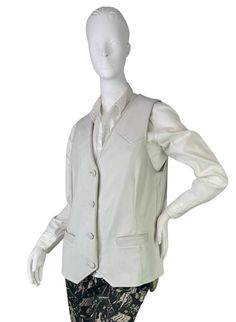 "This is a vintage c.1960's Hays Leathers of Delta, Colorado off-white deer or elk leather button up vest, women's size medium/large. Excellent condition except for some faint marks as shown. Estimated to be a women's size medium/large. This vest is lined with an acetate or rayon fabric. All photos displayed are of the actual item. Measurements; Length: 25 3/4\" Chest (pit to pit): 19\" across Waist: 19 1/2\" across Hem: 22\" across Arm hole height: 10\"" Delta Colorado, Leather Button Up, White Deer, Vest Outfits, Leather Vest, Rayon Fabric, Photo Displays, Womens Vest, Deer