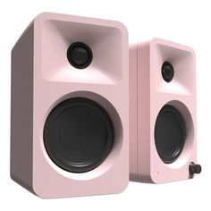 two pink speakers sitting next to each other on a white surface with black knobs