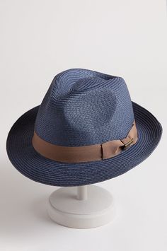 This packable, retro style fedora offers style, nostalgia, and summer shade, for expressive headwear that pairs with any outfit. A bold grosgrain and bow accent the narrow brim, while CoolMax technology keeps you comfortable all season. Comfort sweatband. Classic Summer Fedora In Solid Color, Classic Fedora Hat With Upf 50+, Adjustable Solid Color Panama Hat For Kentucky Derby, Adjustable Solid Panama Hat For Kentucky Derby, Classic Fedora With Upf 50+ And Adjustable Fit, Brimmed Fedora For Kentucky Derby Travel, Brimmed Fedora For Travel And Kentucky Derby, Classic Outdoor Fedora For Spring, Classic Spring Fedora For Outdoor