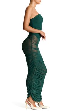 A bodysuit-inspired lining is the only opaque feature of this strapless maxi dress made of sheer mesh with shirred sides for extra texture. Slips on over head Strapless Partially lined 95% nylon, 5% spandex Hand wash, line dry Imported Fitted Sheer Green Mesh Dress, Green Fitted Sheer Mesh Dress, Fitted Green Sheer Mesh Dress, Sheer Stretch Backless Maxi Dress, Stretch Sheer Backless Maxi Dress, Stretch Maxi Dress With Ruched Sides For Night Out, Sheer Bodice Maxi Dress For Night Out, Ruched Spaghetti Strap Mesh Dress For Night Out, Stretch Strapless Nylon Dress