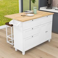 This kitchen island set stands out with its robust iron frame and thicker seating board, designed to provide exceptional comfort and durability. The rubberwood tabletop is not only water and stain-resistant but also features a versatile drop leaf that allows you to extend the surface for cooking or fold it down to save space. This kitchen island offers ample storage with four drawers and a large cabinet, all featuring smooth glides for easy access. Equip your kitchen with this stylish yet practi Mini Kitchen Island, Kitchen Island With Drop Leaf, Seating Board, Drop Leaf Kitchen Island, Island Crafts, Wood Kitchen Island, Farmhouse Kitchen Island, Central Kitchen, Island Countertops