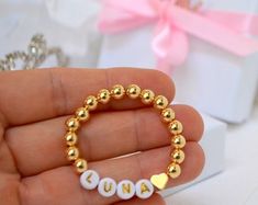 14k Solid Gold Baby Bracelet With Double Heart Charm / Adjustable Toddler Child Bracelet for Kids / Baby Shower Gifts / Baptize Gift - Etsy Gold Heart Charm Bracelet For Birthday, Gold Heart Beads Name Bracelet, Gold Name Bracelet With Heart Beads, Gold Heart Name Bracelet With Heart Beads, Adjustable 14k Gold Rosary Bracelet Gift, Gold Heart Bracelet With Charms For Mother's Day, Gold Charm Bracelet With Heart Charm For Birthday, Gold Charm Bracelet With Heart Charm For Wedding, Gold Heart Beads Jewelry For Birthday