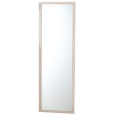 a tall mirror sitting on top of a white wall