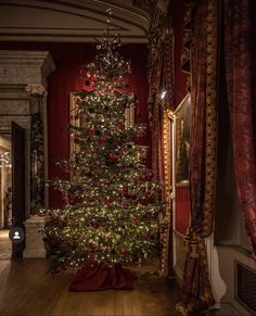 a christmas tree in the middle of a room