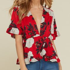 This Beautiful Red Blouse Features Ruffled Sleeves And A Plunging V Neck Neckline. Pair It With A Lacey Bralette Or Rock It Bare. This Is Perfect For A Daytime Stroll Or Night On The Town. S, M, L Order Your True Size. Flirty V-neck Top For Spring, Flirty V-neck Spring Tops, Red Summer Blouse For Vacation, Summer V-neck Blouse For Date Night, Chic Red Blouse For Vacation, Summer Vacation Red Blouse, Summer Floral Print Top For Date Night, Floral Print Top For Date Night In Summer, Floral Print Tops For Summer Date Night