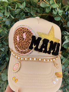 Hat chains are removable with clasps on each end. They can be bought separate or with the hat. Please allow up to 2 weeks for this hat to ship as this is a pre-order item.  $10-$12 chain options do not include hats.  $40-$50 bling hat options do include trucker hat and bling as pictured.  For clarification when purchasing: If you purchase one of the hat chain options, this is individual hat chains and DOES NOT include the trucker hat. If you purchase the bling hat option, this option includes th Trendy Gold Cap, Trendy Adjustable Gold Hats, Trendy Gold Snapback Hat, Handmade Gold Cap, Adjustable Gold Hats For Gifts, Adjustable Gold Hats As Gift, Trendy Gold Hat As Fashion Accessory, Trendy Gold Hat As A Gift, Trendy Gold Hats As Fashion Accessory