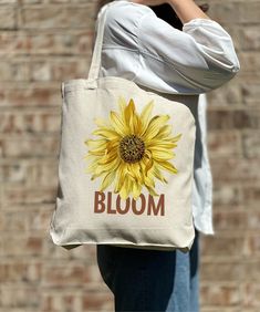 Sunflower Costume Tote Bag, Flower Tote Bag, Casual Tote Bag, Cute Tote, Nature Lover, Women Shoulder Shirt, Gift For Women, Tote Bag Aesthetic 🎉 Welcome to Our Eco-Chic Boutique! 🎉 💐 We're Absolutely Delighted to Have You! 💐 Diving into our boutique feels like uncovering a secret garden of treasures, all thoughtfully selected with you in mind. Our mission is to fill your world with joy and satisfaction, handpicking each piece to ensure your shopping journey with us is nothing short of wonde Sunflower Costume, Sunflower Tote Bag, Bridesmaid Tote Bags, Bachelorette Gift, Flower Tote, Bag Flower, Casual Tote Bag, Gift Totes, Bag Aesthetic