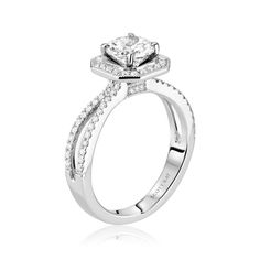 a white gold engagement ring with diamonds on it