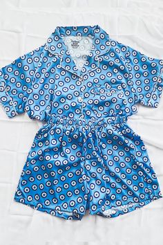 Our luxuriously soft Evil Eye Pajamas are perfect for weddings, bridal parties, holidays, getaways, bachelorette weekends, vacations, or just lounging at home. Features a button front shirt and elastic waist bottoms. Shorts feature hidden pockets. These pajamas are in production and require 5-6 weeks before shipment. Eye Shirt, Pattern Clothes, Cute Pajama Sets, Bridal Party Robes, Wedding Robe, Bridal Parties, Cute Pajamas, Bachelorette Weekend, Bridesmaid Robes