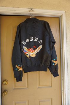 "Vintage embroidered KOREA souvenir jacket. Labeled size XL. Good vintage condition. Measurements taken across front lying flat 23\" armpit to armpit 15\" across waist 26\" length" Streetwear Long Sleeve Tops With Embroidered Patch, Long Sleeve Tops With Machine Embroidery For Streetwear, Fall Outerwear With Floral Embroidery, Embroidered Patch Tops For Streetwear In Fall, Spring Embroidered Crew Neck Outerwear, Winter Streetwear Top With Machine Embroidery, Casual Long Sleeve Outerwear With Machine Embroidery, Spring Streetwear Tops With Custom Embroidery, Embroidered Winter Festival Tops