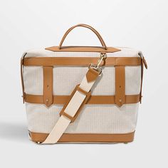 Paravel Scout Tan Weekender Bag | Crate & Barrel Beige Canvas Travel Bag With Double Handle, Beige Canvas Shoulder Travel Bag, Classic Large Capacity Coated Canvas Satchel, Coated Canvas Weekender Bag With Adjustable Strap, Classic Beige Weekender Bag With Double Handle, Rectangular Weekender Bag With Leather Trim For Weekend Trips, Beige Rectangular Weekender Bag With Adjustable Strap, Everyday Rectangular Canvas Luggage, Rectangular Luggage With Leather Trim For Everyday Use