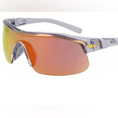 Show Off Your Fresh Look With The Nike Show X1 Sunglasses. The Tr90 Injected Frames Afford Durability, While The 1-Piece Lens Offers Increased Coverage And Clarity. The Uva And Uvb Sun Protection Shields Against Harmful Uv Rays, And The Ventilated Rubber Nose Bridge Helps Reduce Fogging. Features And Benefits Tr90 Injected Frames Afford Durability 1-Piece Lens Offers Increased Coverage And Clarity 100% Uva And Uvb Sun Protection Shields Against Harmful Uv Rays Ventilated Rubber Nose Bridge Helps Modern Orange Shield Sunglasses With Anti-reflective Coating, Modern Orange Anti-reflective Shield Sunglasses, Modern Orange Shield Sunglasses With Uv Protection, Modern Orange Sunglasses For Outdoors, Modern Orange Sunglasses For Outdoor, Cell Phone Holster, Nike Accessories, Phone Holster, Nose Bridge