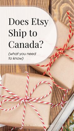 presents wrapped in brown paper with red and white twine tied around them on top of a wooden table