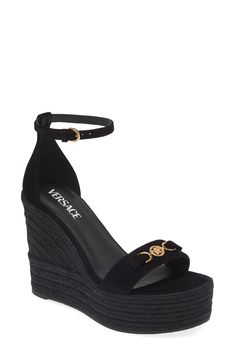 Versace throws it back to the '90s with this ankle-strap sandal branded with Medusa '95 hardware and grounded by a jute-wrapped wedge and platform. 4 1/2" (114mm) heel (size 38.5) 2" platform; 3 1/2" strap height Adjustable ankle strap with buckle closure Leather upper and lining/rubber sole Made in Spain Designer Shoes Black Designer Heels, Versace Gold, Versace Shoes, Espadrille Wedge, Heels & Wedges, Sandals Brands, Designer Heels, Wedge Sandal, Espadrilles Wedges