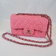 Elevate Your Style With This Beautiful Chanel Mini Classic Handbag In Fuchsia. The Bag Is Adorned With A Woven Tweed Wool Exterior In A Lovely Pink Hue That Is Perfect For Adding A Pop Of Color To Any Outfit. The Gold Hardware And Crossbody Strap Add A Touch Of Elegance To The Bag, Making It Perfect For Any Occasion. The Bag Has A Turn Lock Closure That Ensures Your Belongings Are Safe And Secure. The Bag Is Small In Size, Measuring 7.8" In Width, 4.7" In Height, And 2.3" In Depth, With A Strap Drop Of 21" Making It Perfect For Carrying Just Your Essentials. The Leather Lining In Pink Color Adds A Touch Of Luxury To The Bag, While The Chain Strap Ensures Comfort And Convenience. This Chanel Mini Classic, Chanel Mini, Classic Handbags, Pink Leather, Chain Strap, Chanel Bag, Bag Making, Gold Hardware, Pink Color