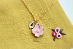 Super cute Cherry blossom necklace in gold ▶▶ You can make this necklace personal choosing the initial from option. You can add more initials from following link. https://www.etsy.com/listing/188788608/personalized-initial-leaf-charms-for?ref=shop_home_active_1&pro=1 ▶ Material - Gold plated over brass, pearl ▶ Chain Length - 14~ 20 inches (adjustable chain. please choose desired length from option) ▶ Pendant measure - H. 14mm x W. 13mm ▶The matching earrings available from following link. h Delicate Blossom Jewelry Gift, Delicate Blossom-colored Jewelry For Gifts, Delicate Blossom Colored Jewelry As Gift, Dainty Personalized Flower Necklace For Wedding, Personalized Flower Necklace For Wedding, Cute Flower Necklace For Gift, Cute Flower Shaped Necklace For Gifts, Cute Flower Shaped Necklaces For Gifts, Personalized Pink Flower Necklace