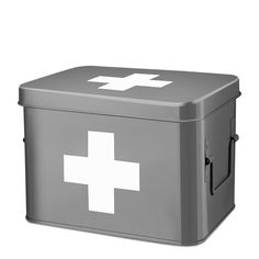 a large metal box with a white cross on the front and sides, in grey