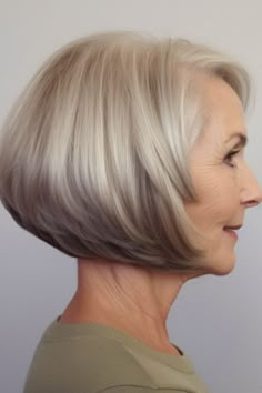 Consider an angled stacked bob if you’re after a modern twist on a classic style. The stacked haircut in the back lifts your fine hair, providing a fuller appearance. Click here to check out more flattering short hairstyles for women over 70 with fine hair. Medium Stacked Bob Hairstyles, Long Stacked Haircuts, Chin Length Bob Hairstyles, Bobbed Haircuts, Stacked Haircut, Short Angled Bobs, Short Stacked Hair