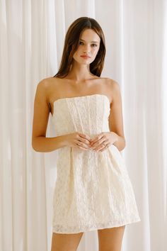 Get an unforgettable look for a special occasion with this Zoey Cream Floral Embroidered Corset Mini Dress. It features a corset, a strapless neckline and a criss-cross lace back detail. Whether you choose to dress it up or down, you'll have a look that's sure to stand out. Composition:Polyester Corest Dresses, Strapless White Dress, Young Women Outfits, Embroidered Corset, White Strapless Dress, Corset Mini Dress, Grad Dresses, Hoco Dresses, Lace Back