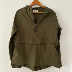 Liv Outdoor Olive Green Anorak With Front Hand Pocket Nwot Green Utility Windbreaker For Fall, Khaki Raincoat For Hiking In Fall, Casual Half-zip Outerwear For Outdoor Activities, Utility Windbreaker For Hiking In Fall, Fall Hiking Utility Windbreaker, Casual Olive Outerwear For Outdoor Activities, Green Half-zip Outerwear For Fall, Spring Khaki Hiking Outerwear, Khaki Outerwear For Hiking In Spring