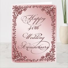 an elegant pink wedding anniversary card