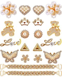 a bunch of different types of jewelry on a white background