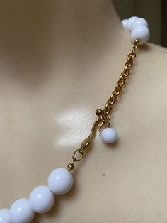 "You must have at least one set of white jewelry just for summer. White pearls don't count. I'm talking fun stuff. Necklace is signed Napier and earrings signed Trifari. Necklace will extend from 16 to 18\" with a hook clasp. Largest front beads are about 18 and 20mm round. They continue to be fairly big at about 10mm near clasp. Earrings are clip backs marked Trifari. Big look at 3\" but the largest section is against the earlobe. Not heavy anyway but I think the largest bead at top is a good i Pearl White Jewelry With Lobster Clasp, Pearl Dangle Jewelry With Lobster Clasp, Elegant Jewelry With Dangling Round Beads, Modern White Pearl Chain Necklace, Adjustable Single Strand White Jewelry, White Adjustable Single Strand Jewelry, Adjustable White Single Strand Jewelry, Classic White Jewelry With Polished Beads, White Pearl Chain Jewelry For Party