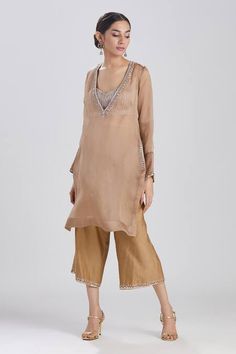 Buy Brown Satin Silk Organza Aarzoo Neckline Kurta And Culotte Set For Women by Megha Bansal Online at Aza Fashions. Embroidered Anarkali Palazzo Set With Long Sleeves, Hand Embellished Georgette Sets With Long Sleeves, Hand Embellished Long Sleeve Georgette Sharara, Embellished Traditional Wear With Long Sleeves For Eid, Hand Embellished Long Sleeve Georgette Sets, Hand Embellished Long Sleeve Palazzo Set For Wedding, Embellished Traditional Wear For Eid, Embellished Long Sleeve Traditional Wear For Eid, Festive Hand Embellished Long Sleeve Sets