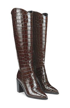 A curved topline creates a Western-inspired aesthetic on a knee-high boot balanced by a pointy toe and stacked block heel. 3 1/2" heel (size 8.5) 14" shaft, 14 1/2" circumference Side zip closure Cushioned footbed with arch support Leather upper/synthetic lining and sole Made in Brazil Tall Heeled Boots For Fall Formal Events, Tall Heeled Boots For Formal Fall Occasions, Tall Boots With Stacked Heel For Work, Knee-high Platform Boots With Stacked Heel, Formal Fitted Tall Platform Boots, Formal Tall Fitted Platform Boots, Formal Tall Boots With Stacked Heel, Elegant Tall Heeled Boots With Stacked Heel, Formal Knee-high Platform Boots With Stacked Heel