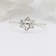 Item Specifications: Face Height: 8.7 mm Finish: Oxidized Metal Material: Sterling Silver Custom orders welcome! Sterling Silver Star-shaped Spiritual Rings, Silver Star-shaped Spiritual Rings, Spiritual Sterling Silver Star Rings, Spiritual Silver Star-shaped Rings, Sterling Silver Star Of David Ring Gift, Silver Star Of David Ring In Spiritual Style, Silver Spiritual Rings With Star Of David, Silver Star Of David Spiritual Rings, Symbolic Sterling Silver Star Of David Ring