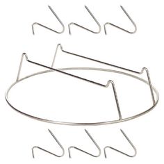 four metal wire hangers on a white background